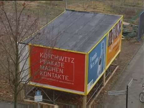 Single Room Hotel Between Billboards