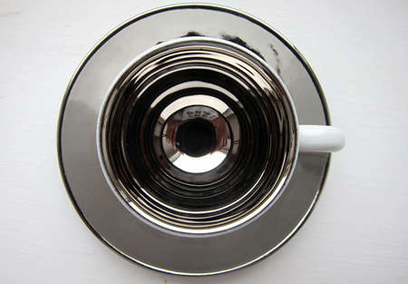 Reflective Sculptural Coffee Cups