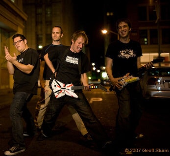 Real Rock Band Uses Plastic Instruments