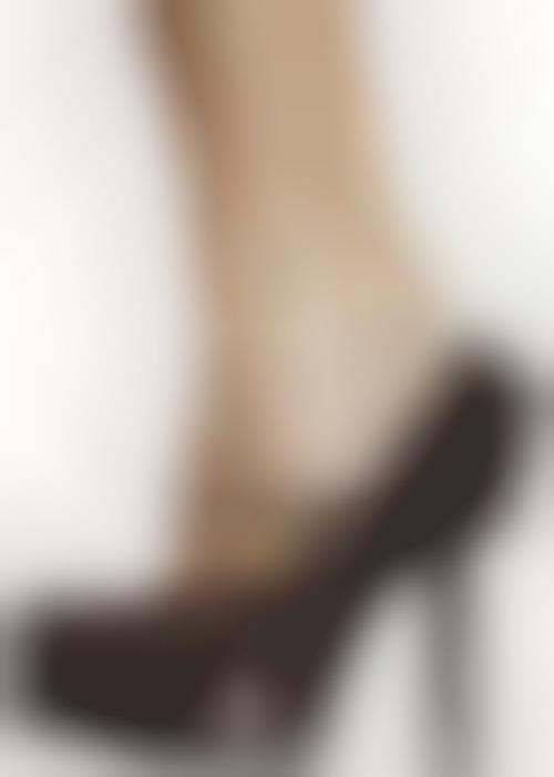Heel-Wearing Man Shoots