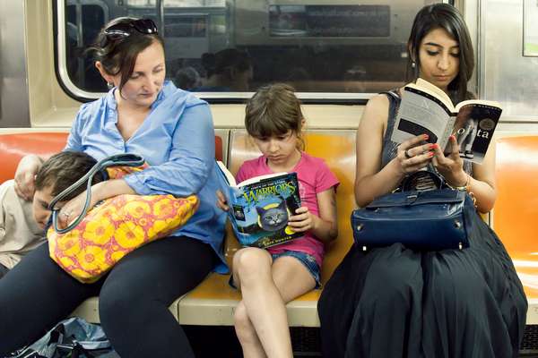 Reading Urbanite Subway Riders