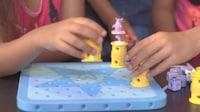 Female Technician Teaching Toys Image 3