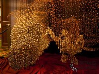 Golden Serpentine Sculptures Image 2