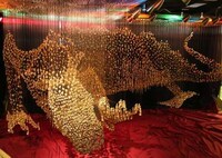 Golden Serpentine Sculptures Image 6