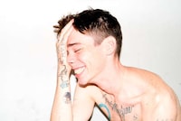 Goofy Tattooed Model Portraits Image 3