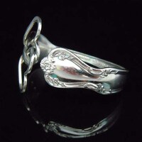 Elegantly Curved Utensil Jewelry Image 8