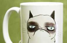 Frowning Feline Mugs