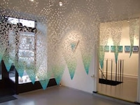 Delicate Cascaded Paper Sculptures