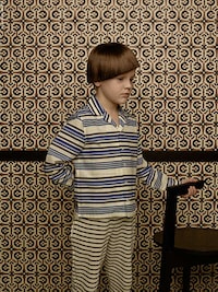 Stoically Eccentric Kid Captures Image 6