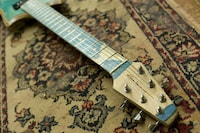 Upcycled Skateboard Guitars Image 6
