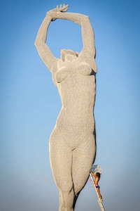 Graceful Giant Female Sculptures Image 5