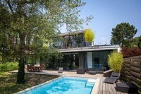 Environment-Contrasting Villas Image 7