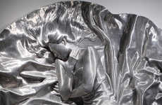 Meticulously Wrapped Metal Figurines