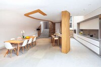 Curvaceous Timber Rooftop Residences Image 2