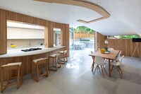 Curvaceous Timber Rooftop Residences Image 5
