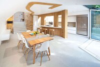 Curvaceous Timber Rooftop Residences Image 6