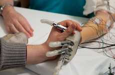 Feeling-Restoring Prosthetic Hands