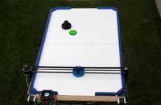 Air Hockey-Playing Robots