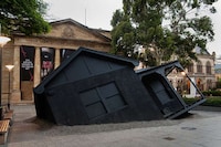 Sunken House Architectural Statues Image 2