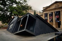 Sunken House Architectural Statues Image 3