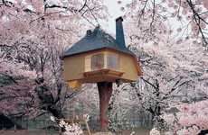 Flowery Tree Trunk Houses