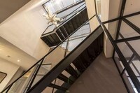 Steel Staircase-Centered Apartments Image 7