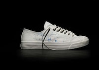 Paint-Cracking White Sneakers Image 3