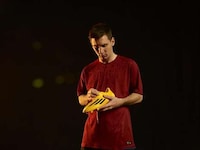 Yellow-Drenched Soccer Boots Image 4