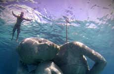 Massive Submerged Girl Sculptures