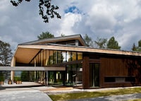 Mirrored Forested Cabins Image 4