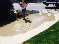 Rain-Activated Street Art Image 6