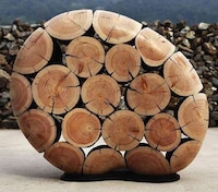Discarded Tree Trunk Sculptures Image 2