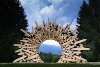 Discarded Tree Trunk Sculptures Image 4