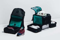 Compartmentalized Sneaker Luggage Image 2