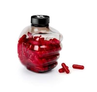Fist-Shaped Supplement Packaging Image 4