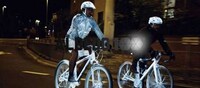 Reflective Cyclist Sprays Image 2