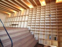 Leaning Book-Filled Homes Image 2