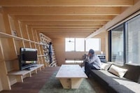 Leaning Book-Filled Homes Image 3