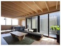 Leaning Book-Filled Homes Image 4