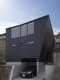 Leaning Book-Filled Homes Image 5