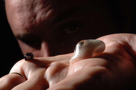 Eye-Mounted Videocameras