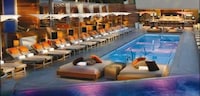 Topless Poolside Lounges Image 2