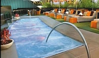 Topless Poolside Lounges Image 3