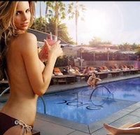 Topless Poolside Lounges Image 5
