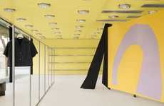 Sculptural Yellow-Clad Retail Stores