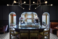 Dark-Lit Elegant Restaurant Interiors Image 3