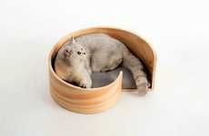 Sculpted Snail-Inspired Feline Beds