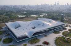 Sizable Wavy-Roofed Arts Centers