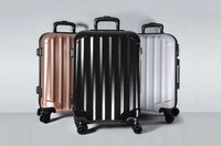 Durable Device-Charging Luggage Image 4