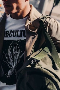 Music-Influenced Clean Cut Fashion Image 5